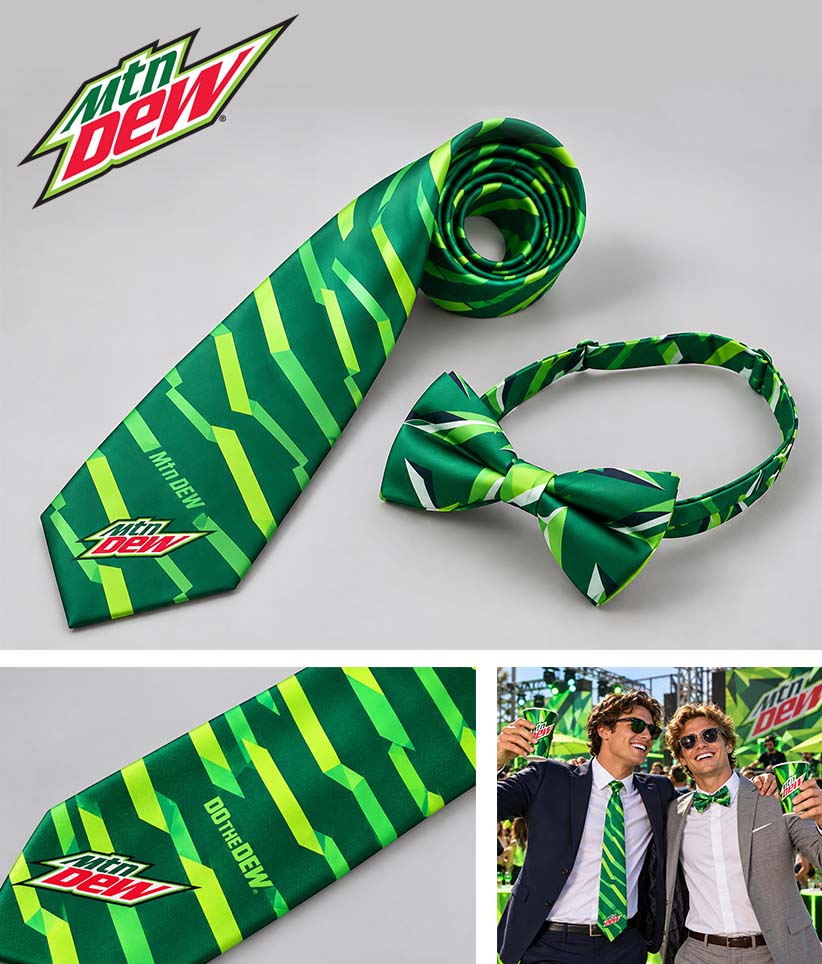 Mountain Dew themed green and yellow striped bow tie set including a necktie, matching bow tie, and a matching wrist strap, shown alongside the Mountain Dew logo and a small lifestyle inset of two men wearing the set.